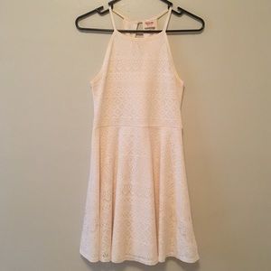 Cream colored knit dress.
